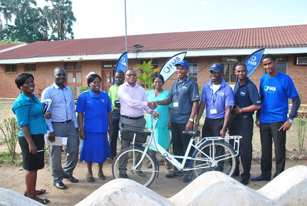 FMB staff hand over bicycles to Mangochi District Hospital Officials